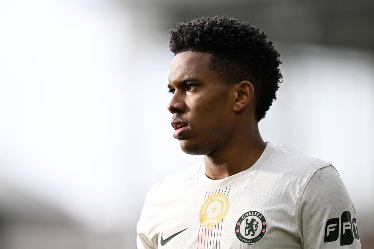 Estevao looks on during a Chelsea match