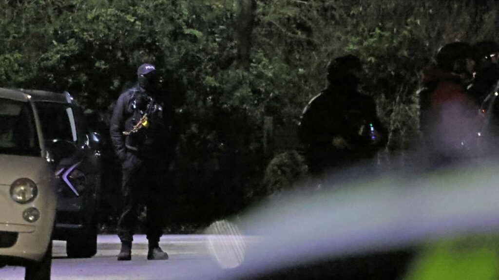 Newton-le-Willows live updates as armed police descend on house