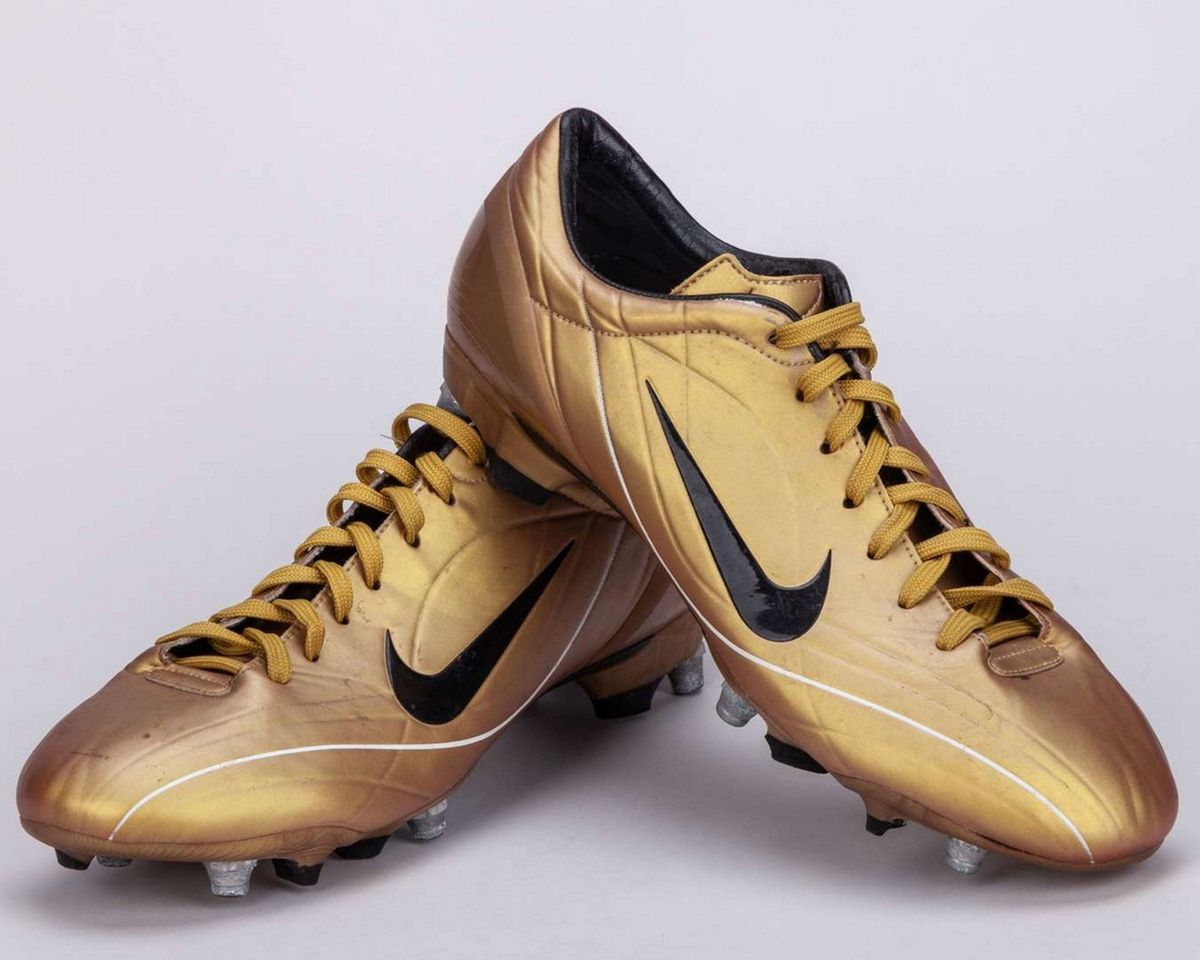 Cristiano Ronaldo a pair of gold Nike Vapor II player worn football boots, 2004, £10,000 - £15,000. Fans of the Red Devils could have a unique way to support their team as an original Manchester United sign from the ground comes up for auction. The six-foot-high red lettering was displayed at the Stretford End of the Old Trafford ground until its redevelopment in 1992. Said to have been gifted to former manager Sir Matt Busby's barber at the time, it is now held by a private collector and carries an estimated value of £40,000–£60,000. Also featured are three pairs of Cristiano Ronaldo boots, including a prototype featuring the earliest CR7 branding, which BUDDS auction say were sourced from a former Manchester United kit cleaner who served the club for approximately 40 years. Estimates for these range from £4,000 to £15,000. BUDDS will hold their 'Made in Manchester' sale on April 28.