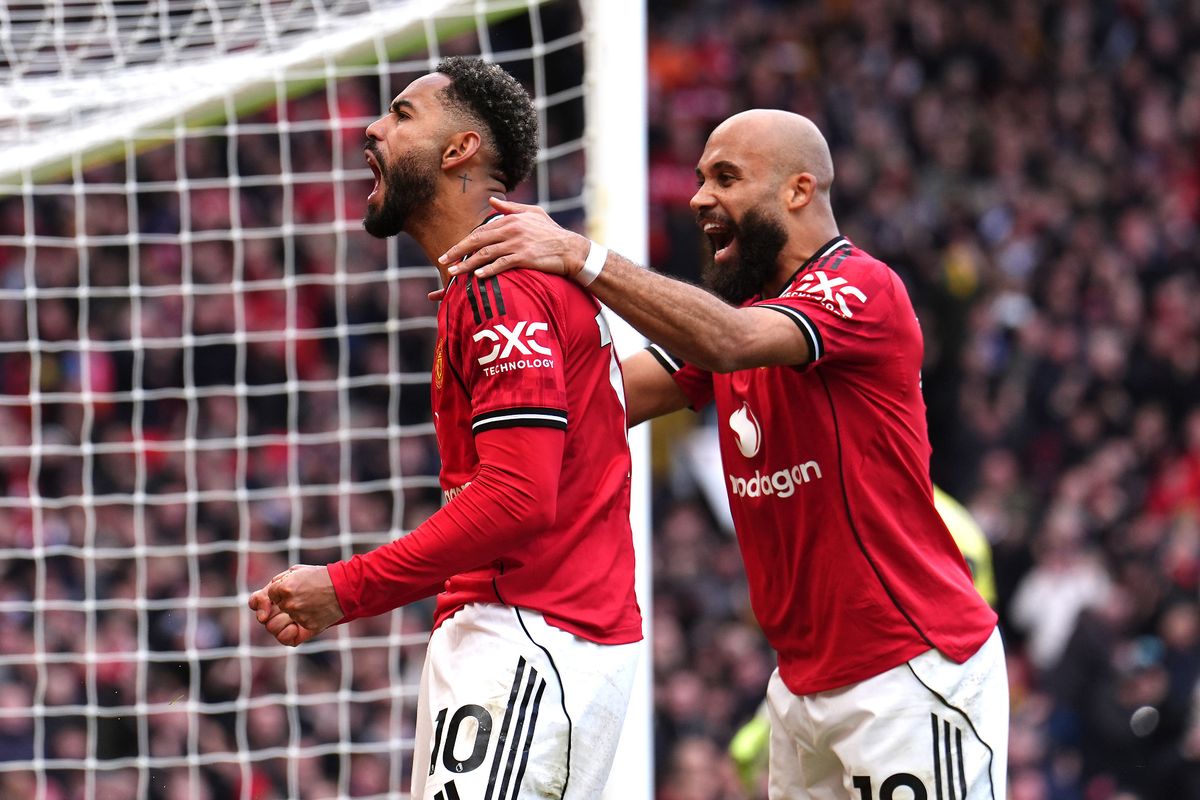 Matheus Cunha and Bryan Mbeumo celebrate