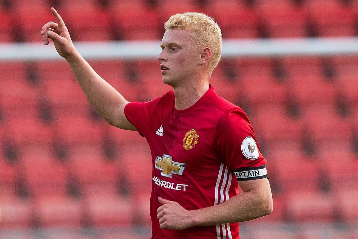 James Weir playing for Manchester United