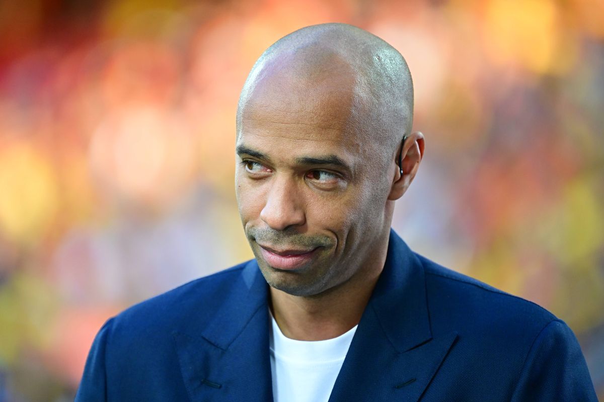 Arsenal legend Thierry Henry looks on