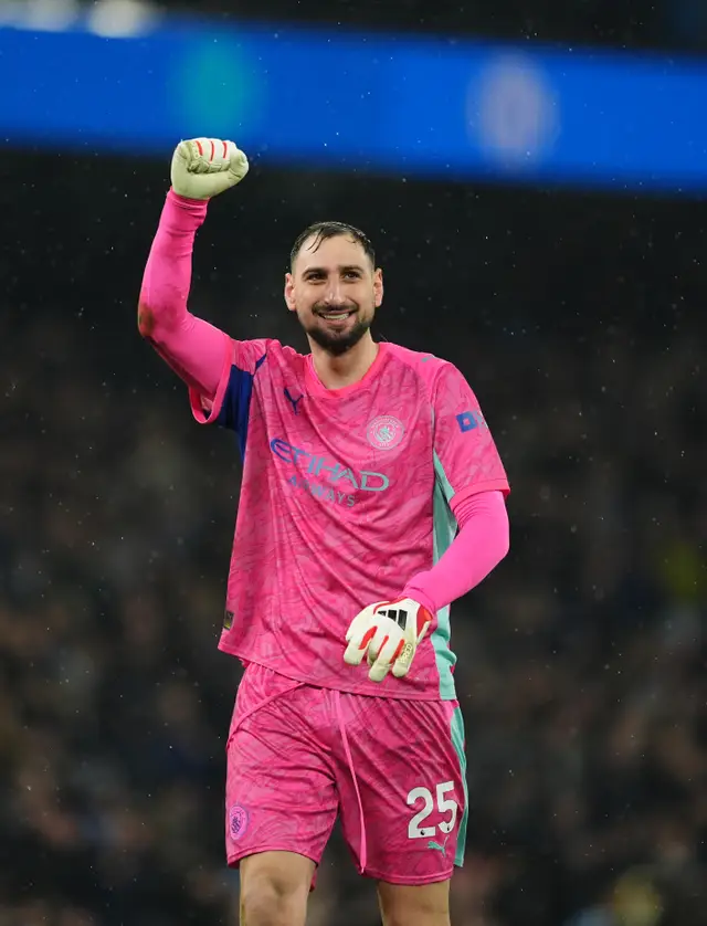 Manchester City goalkeeper Gianluigi Donnarumma punches the air