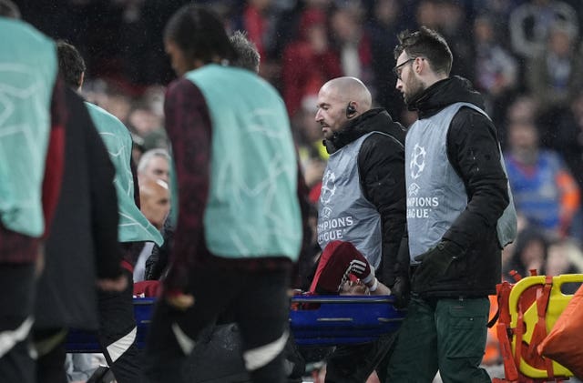 Liverpool’s Hugo Ekitike is carried off injured during the Champions League quarter-final second leg defeat by Paris St Germain
