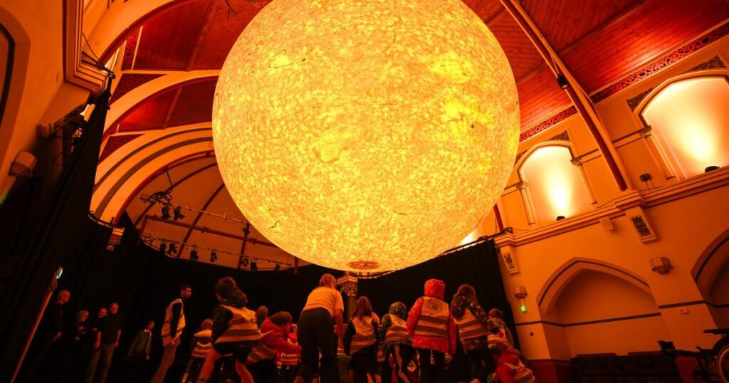 Thousands see illuminated 'Helios' sun artwork in Dorset