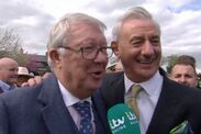 Sir Alex Ferguson and Ian Rush embrace at Aintree