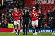 Michael Carrick, manager of Manchester United, applauds the fans after the game during the Premier League match between Manchest