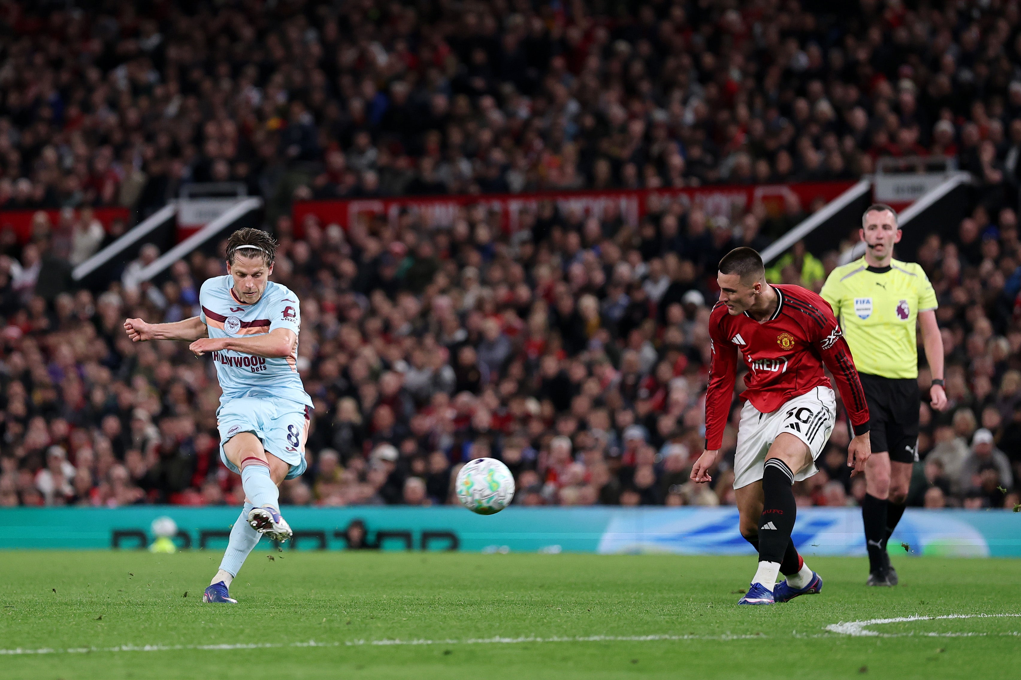 Mathias Jensen scored a late consolation