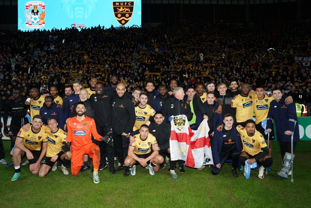 maidstone-united-players-and-staff-after-the-emirates-fa-cup-fifth-round-match-at-the-coventry-building-society-arena-coventry-picture-date-monday-february-26-2024