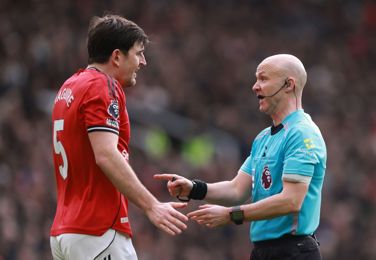 Harry Maguire and Anthony Taylor speak