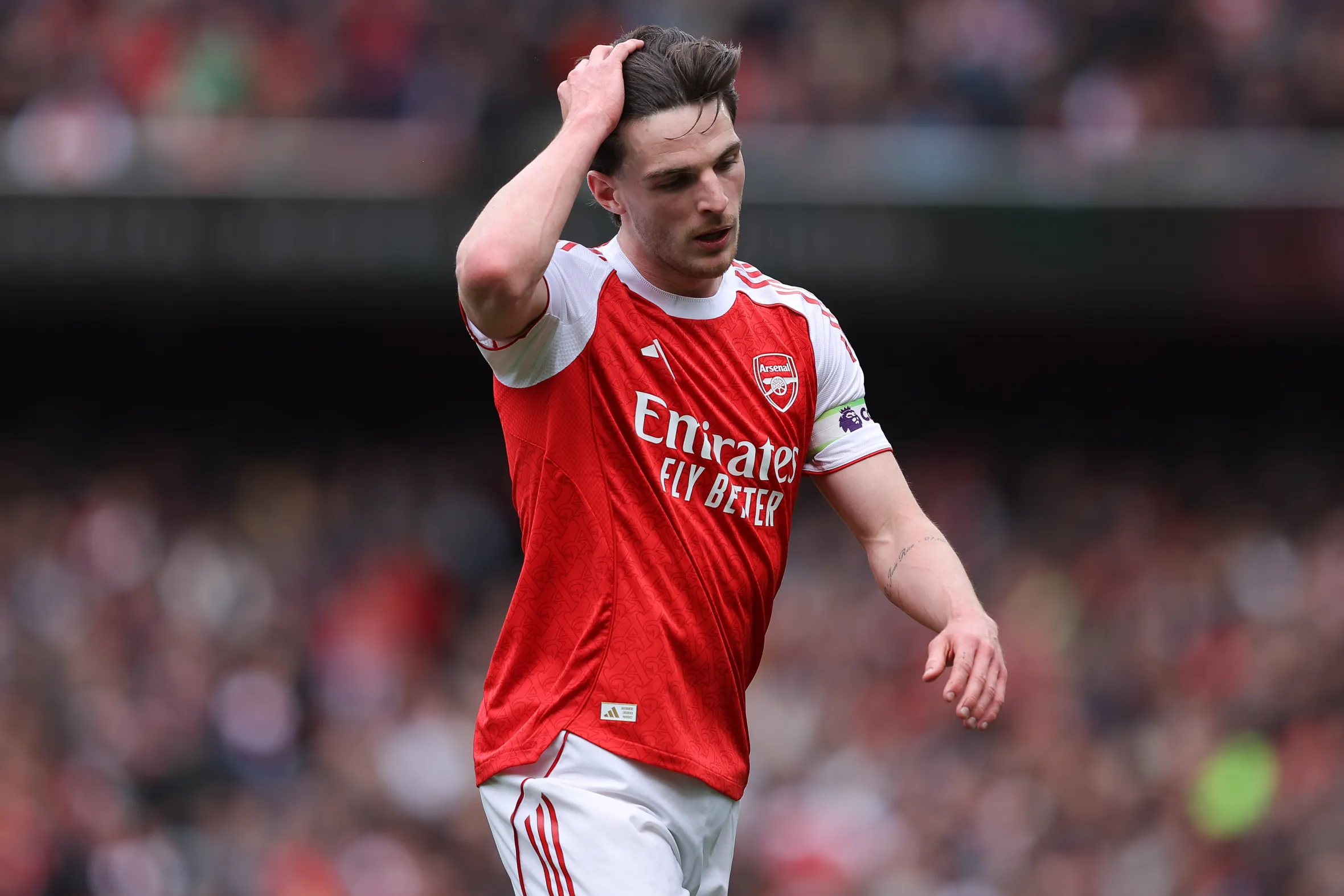 Declan Rice of Arsenal looks dejected during a Premier League match.
