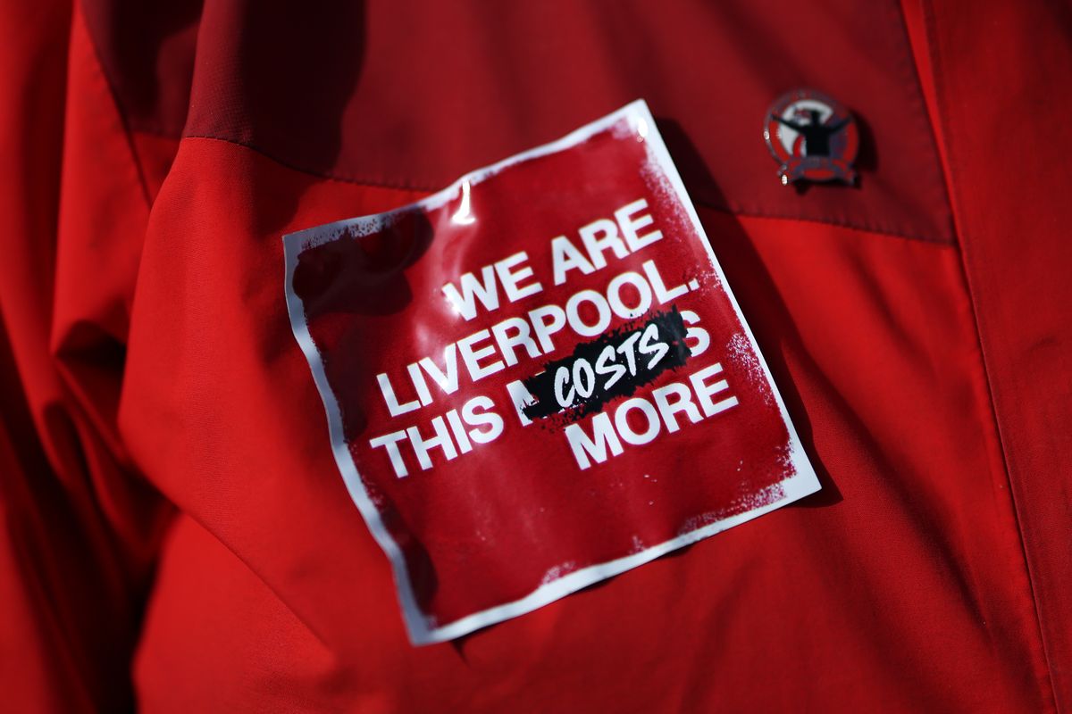 A Liverpool fan sticker is seen outside the stadium in protest against the planned increase in ticket prices prior to the Premier League match against Fulham at Anfield on April 11 2026