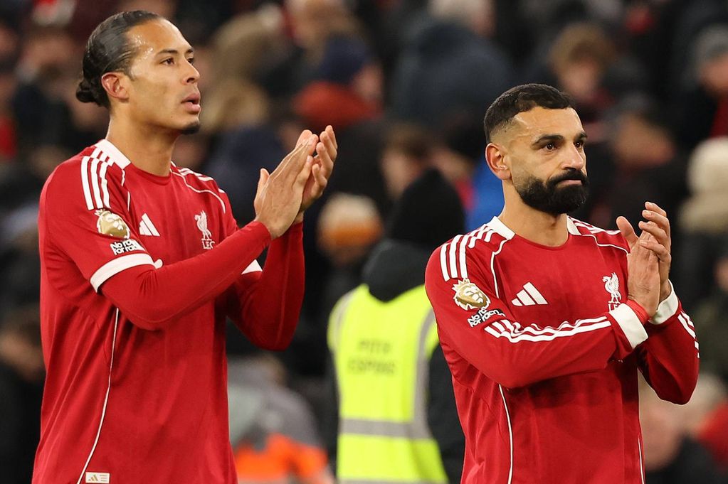 LIVERPOOL, ENGLAND - DECEMBER 03:   (THE SUN OUT, THE SUN ON SUNDAY OUT) Virgil van Dijk and Mohamed Salah of Liverpool applaud fans after the Premier League match between Liverpool and Sunderland at Anfield on December 03, 2025 in Liverpool, England. (Photo by Liverpool FC/Liverpool FC via Getty Images)