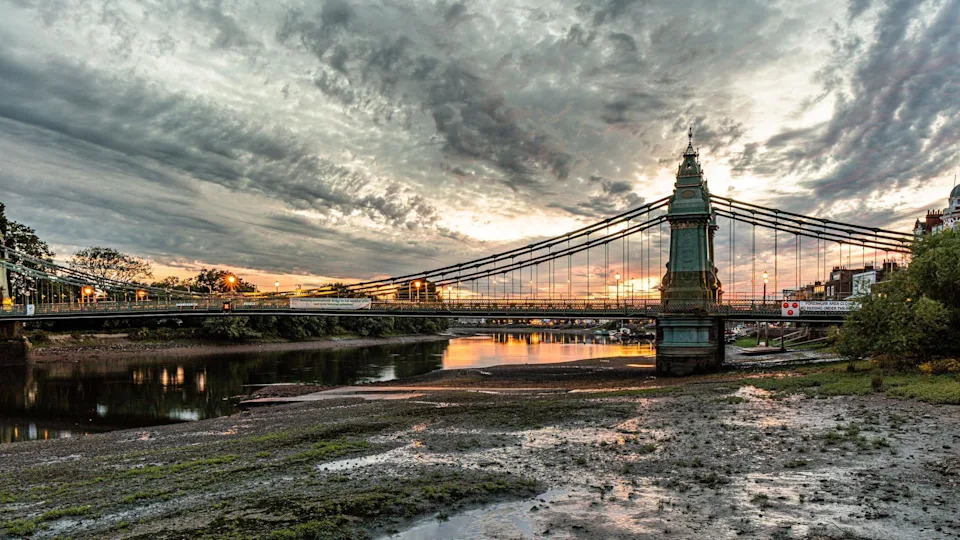 A bridge on the Thames at sunrise. 