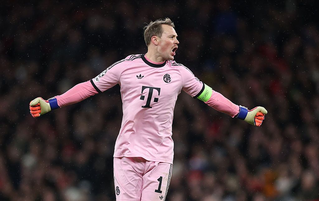 Manuel Neuer of Bayern celebrates his teams first goal during the UEFA Champions League 2025/26 League Phase MD5 match between Arsenal FC and FC Bayern M&uuml;nchen at Arsenal Stadium