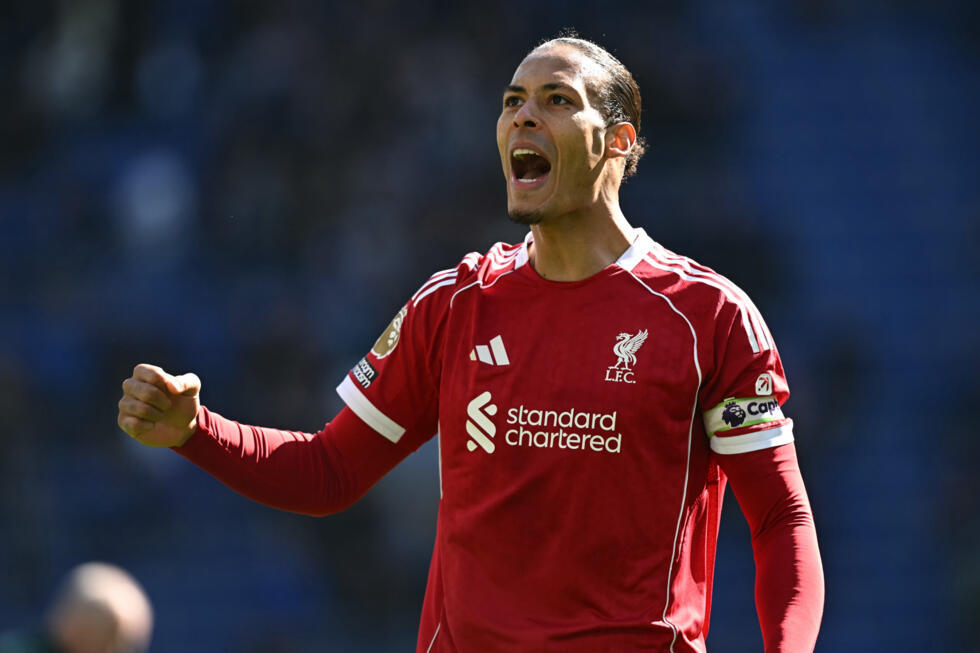 Liverpool defender Virgil van Dijk celebrates after his side's 2-1 win at Everton