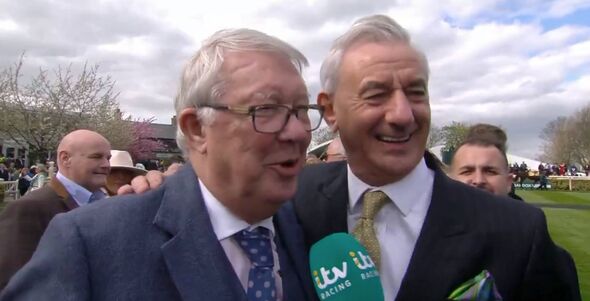 Sir Alex Ferguson and Ian Rush embrace at Aintree