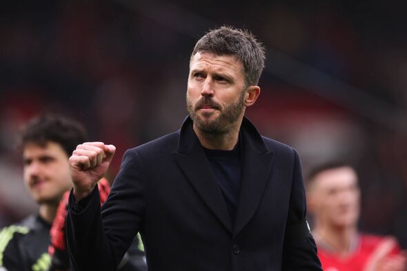 MANCHESTER, ENGLAND - FEBRUARY 07: Michael Carrick, Manager of Manchester United, celebrates victory during the Premier League m