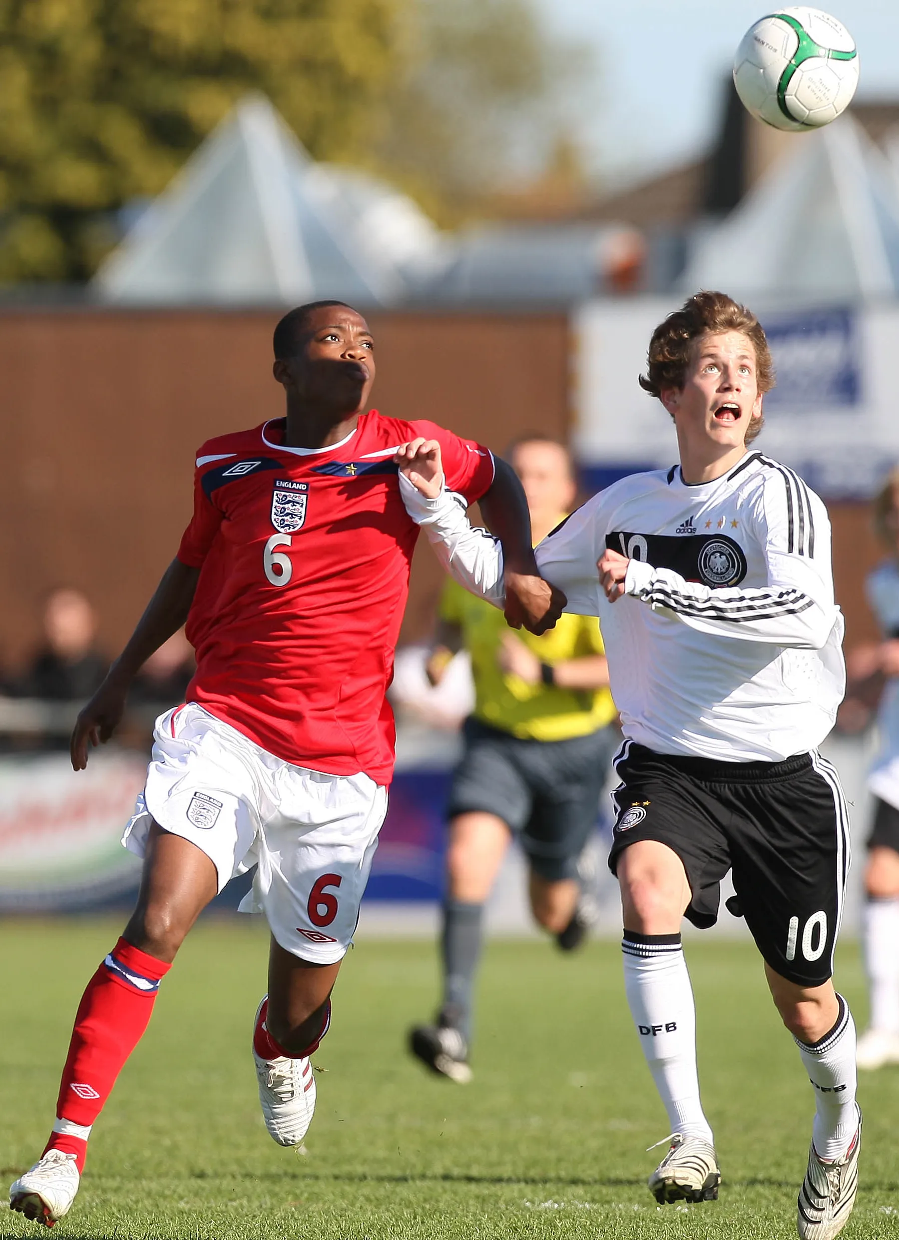 Fabian Hurzeler of Germany and Nathaniel Chalobah of England battle for the ball during an international friendly.