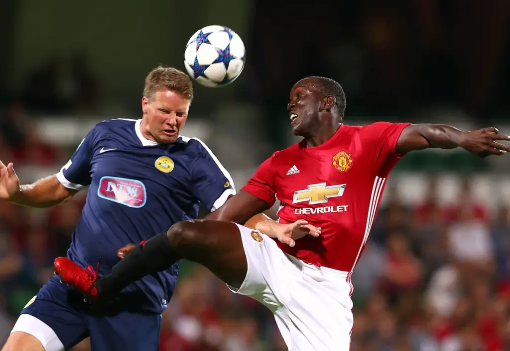 Patrick Zwaanswijk challenges for the ball while playing for Aussie Legends