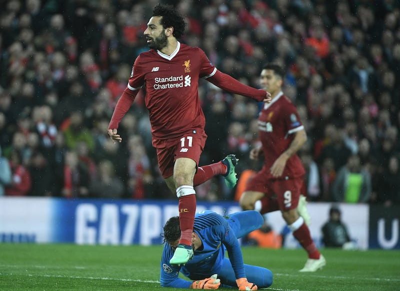 Mohamed Salah scores Liverpool's second goal during a Champions League first leg semi-final against Roma in 2018. Photograph: Filippo Monteforte/Getty