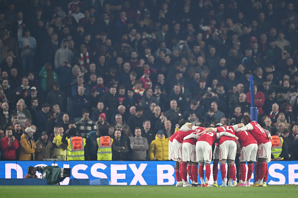 Players of Arsenal huddle prior to the Premier League match between Brighton & Hove Albion and Arsenal at Amex Stadium on March 04, 2026 in Brighton, England.