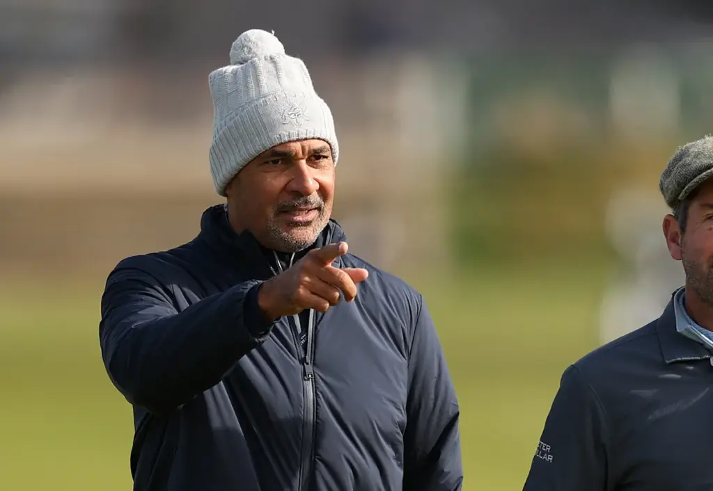 Ruud Gullit points while playing at a charity golf event