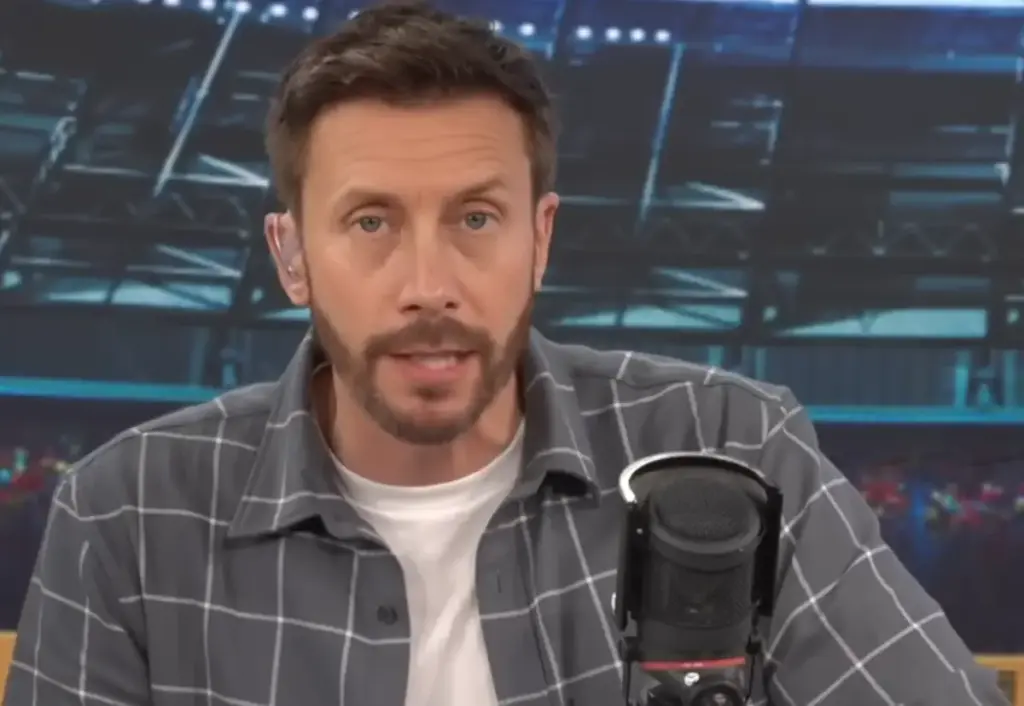 Sam Matterface speaks into the microphone