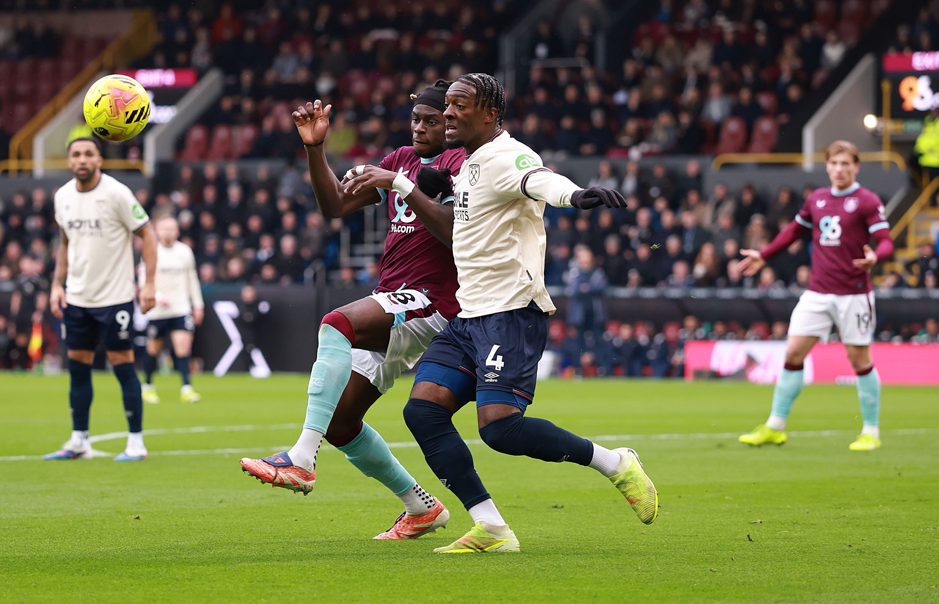 Axel Disasi battles for possession against Burnley.