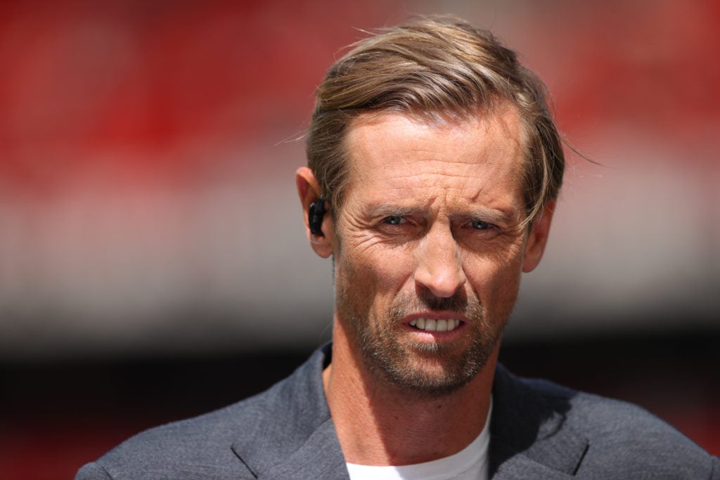 Peter Crouch working as a pundit for a Premier League match.