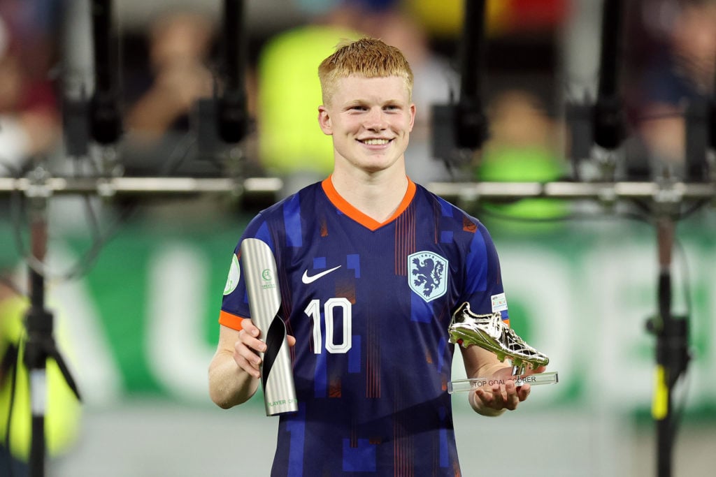 Netherlands U19s midfielder Kees Smit poses with his award.