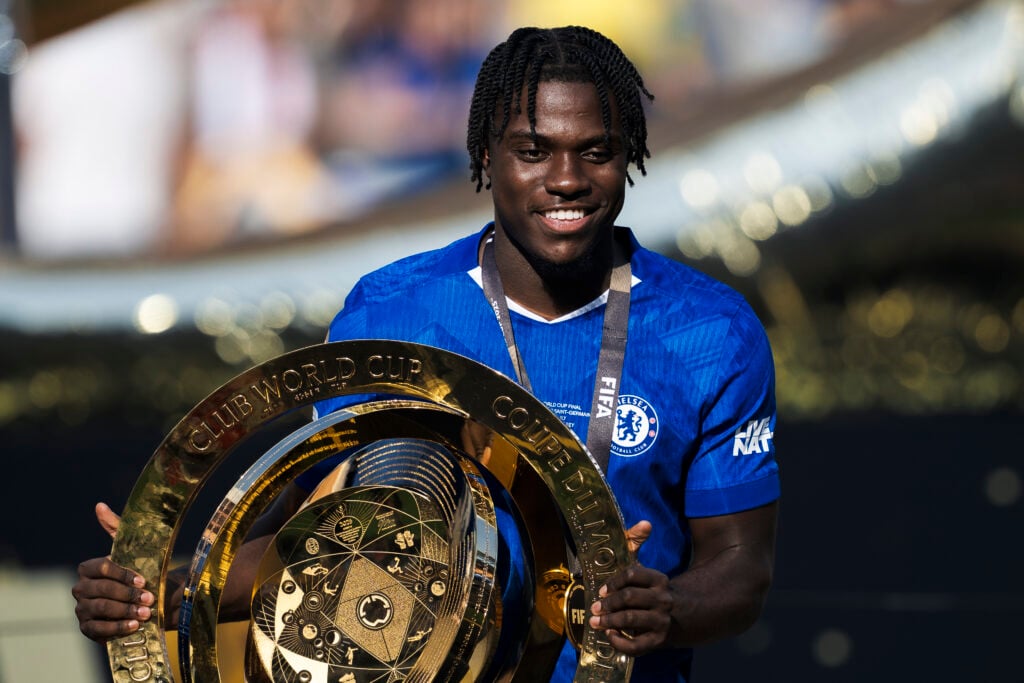 Romeo Lavia of Chelsea FC poses with the trophy