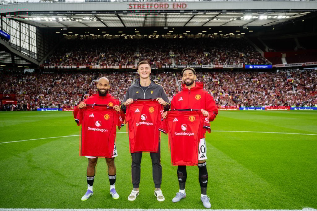 New Manchester United signings Bryan Mbeumo, Benjamin Sesko and Matheus Cunha pose together with team shirts prior to the pre-season friendly match between Manchester United and Fiorentina at Old Trafford in 2025 in Manchester, England.