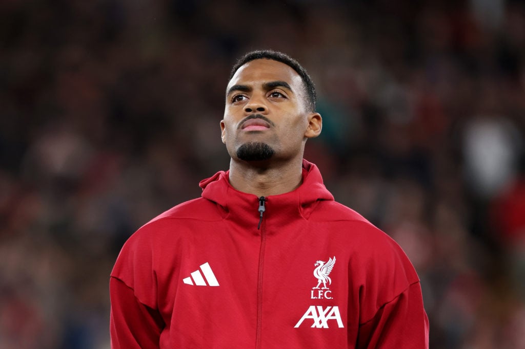 Ryan Gravenberch of Liverpool looks on as the teams line up prior to the UEFA Champions League 2025/26 League Phase MD1 match between Liverpool FC and Atletico de Madrid at Anfield