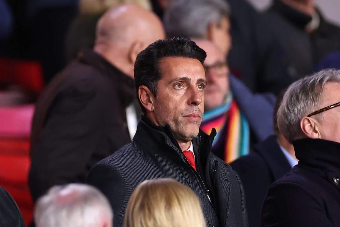 Edu standing in a crowd