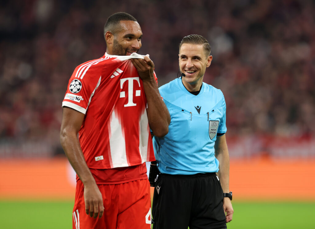 Donatas Rumsas jokes with Jonathan Tah