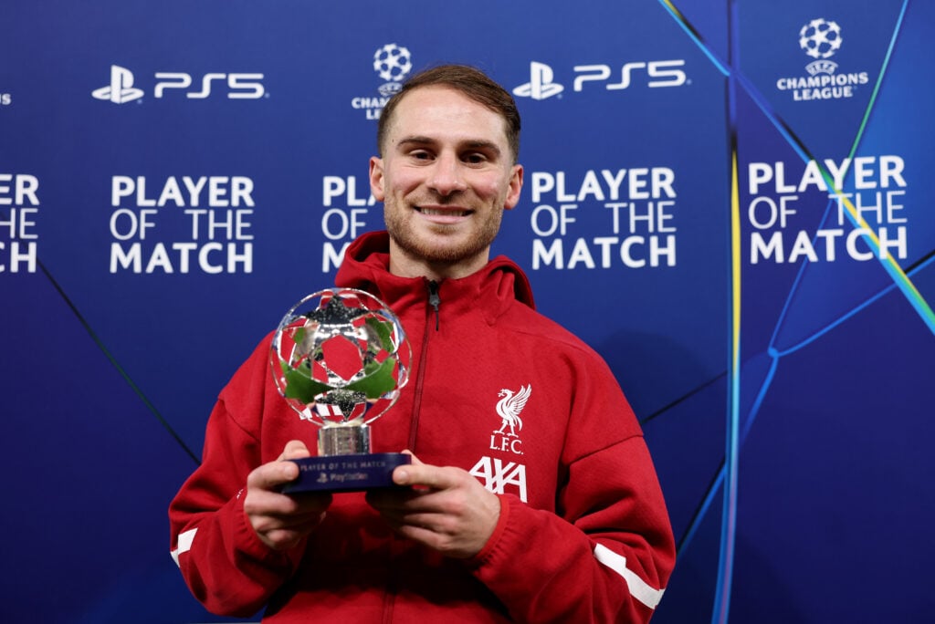 Alexis Mac Allister of Liverpool poses for a photo with the PlayStation Player Of The Match award after the team's victory in the UEFA Champions League 2025/26 League Phase MD4 match between Liverpool FC and Real Madrid C.F. at Anfield