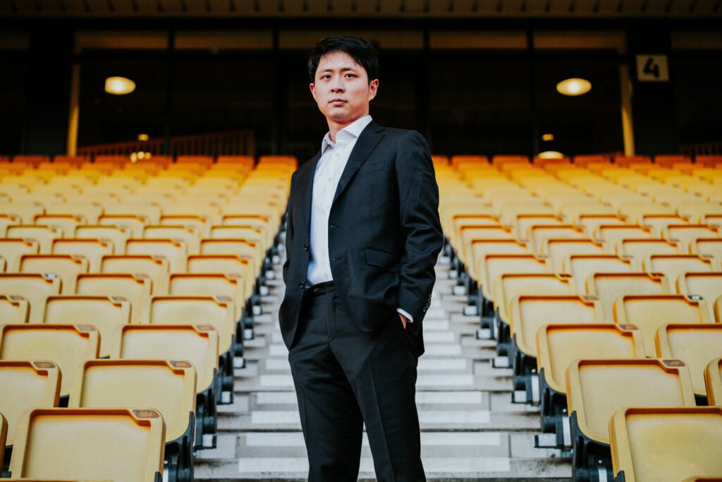 Nathan Shi poses at Molineux.