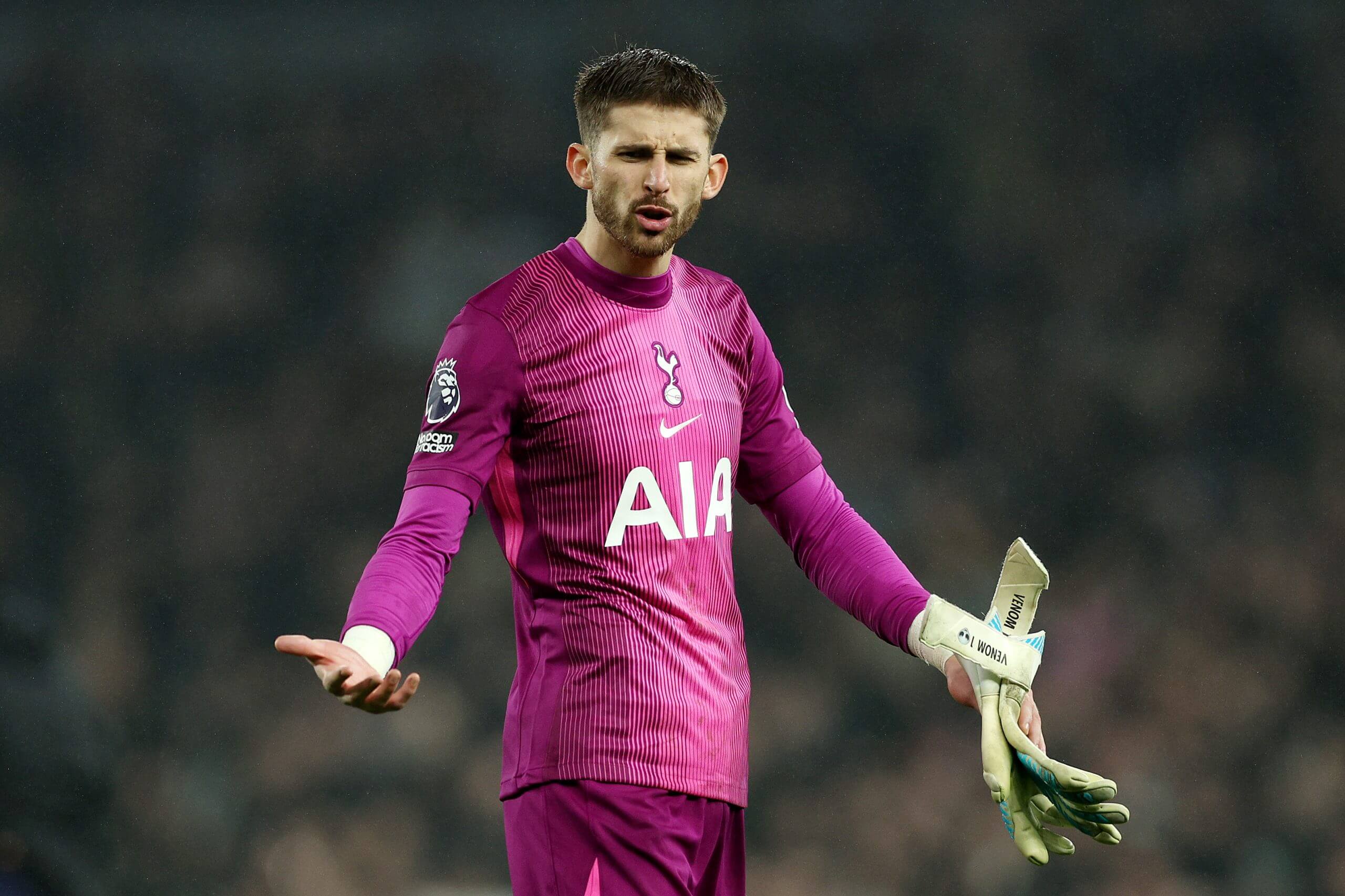 Guglielmo Vicario, arms open wide, reacts to Tottenham's defeat to Newcastle United