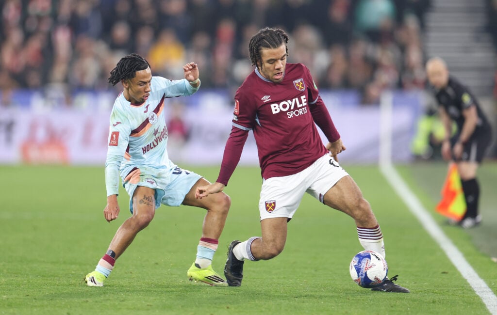 Brentford's Romelle Donovan and West Ham United's Ezra Mayers during the Emirates FA Cup Fifth Round match between West Ham United and Brentford