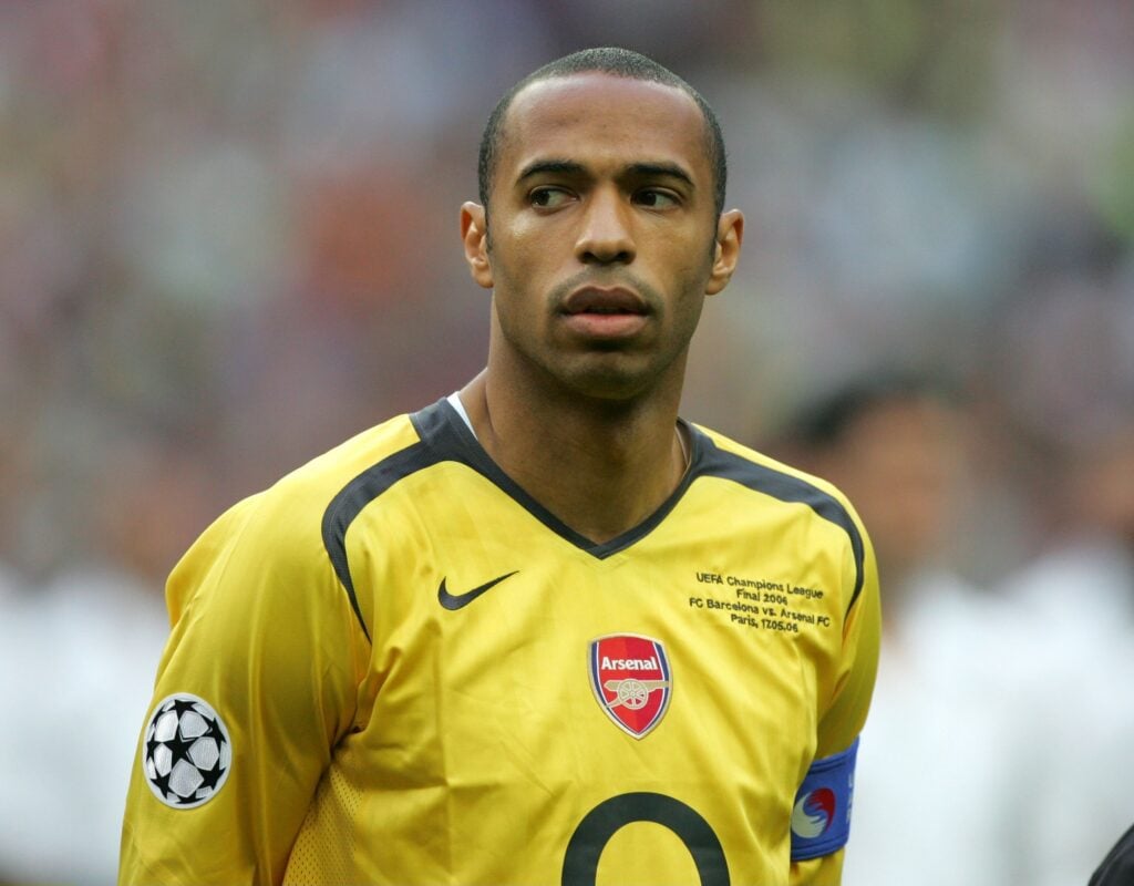 Arsenal legend Thierry Henry looking on after a game