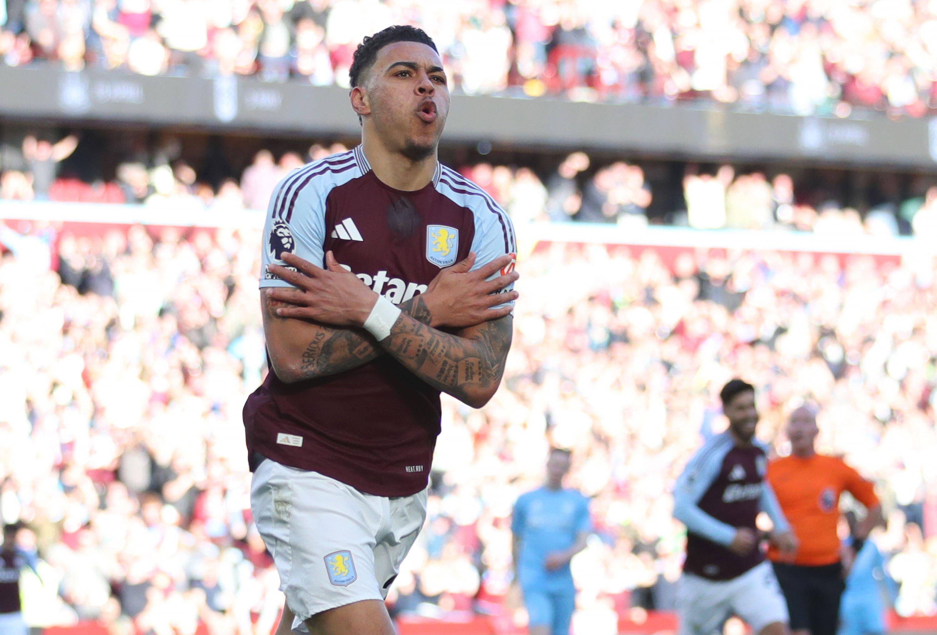Morgan Rogers celebrates with his arms across his chest after scoring the first goal for Aston Villa during the Premier League match against Nottingham Forest in Birmingham, England on 5 April, 2025.