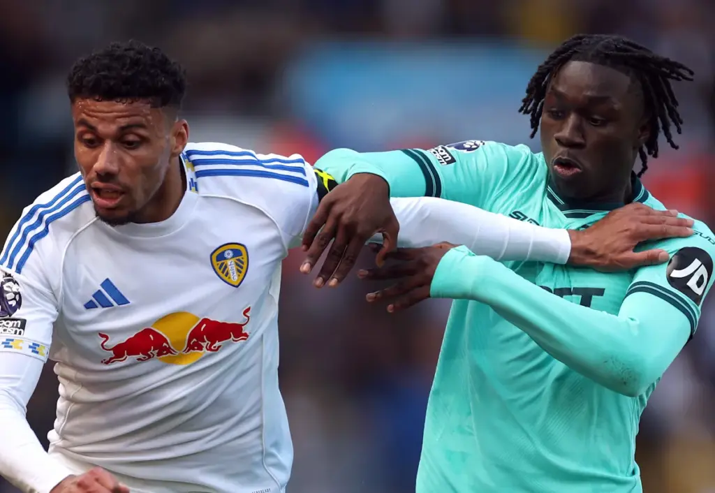 Leeds United's James Justin battles Wolves' Mateus Mane for the ball