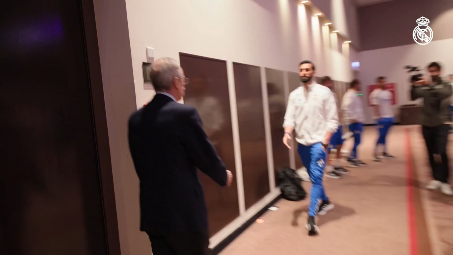 Presi greeting to the player before the match.