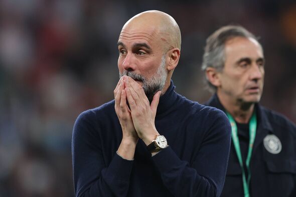 Pep Guardiola reacts after the Carabao Cup Final