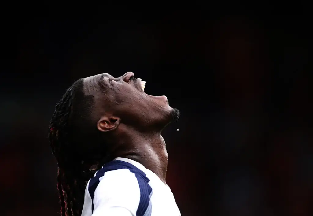 Yves Bissouma looks upwards a shouts during a match