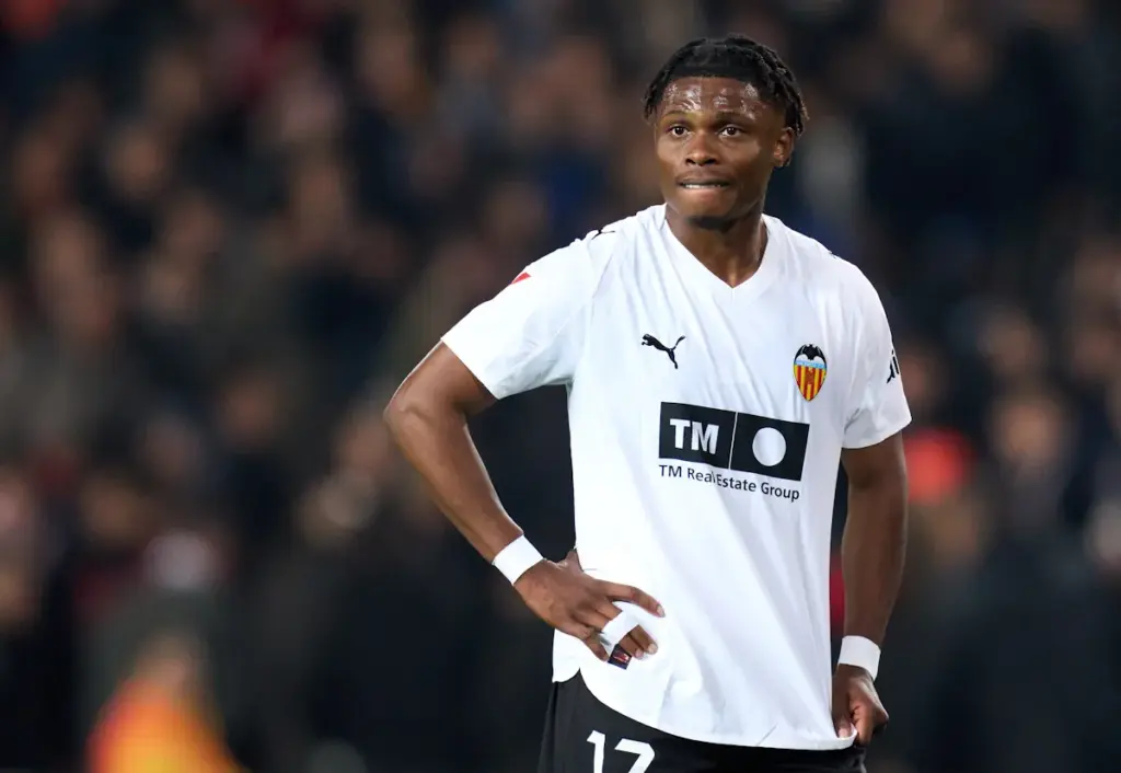 Largie Ramazani looks on with his hands on his hips during a Valencia game