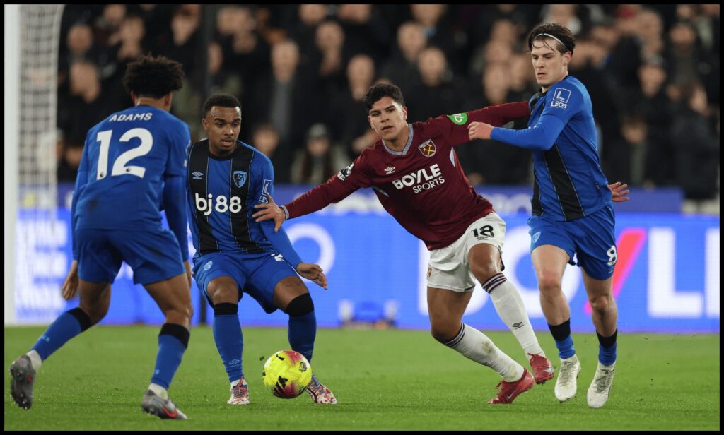 LONDON, ENGLAND - FEBRUARY 21: Mateus Fernandes of West Ham United and Alex Scott of AFC Bournemouth and Tyler Adams of AFC Bournemouth during the Premier League match between West Ham United and Bournemouth at London Stadium on February 21, 2026 in London, England.