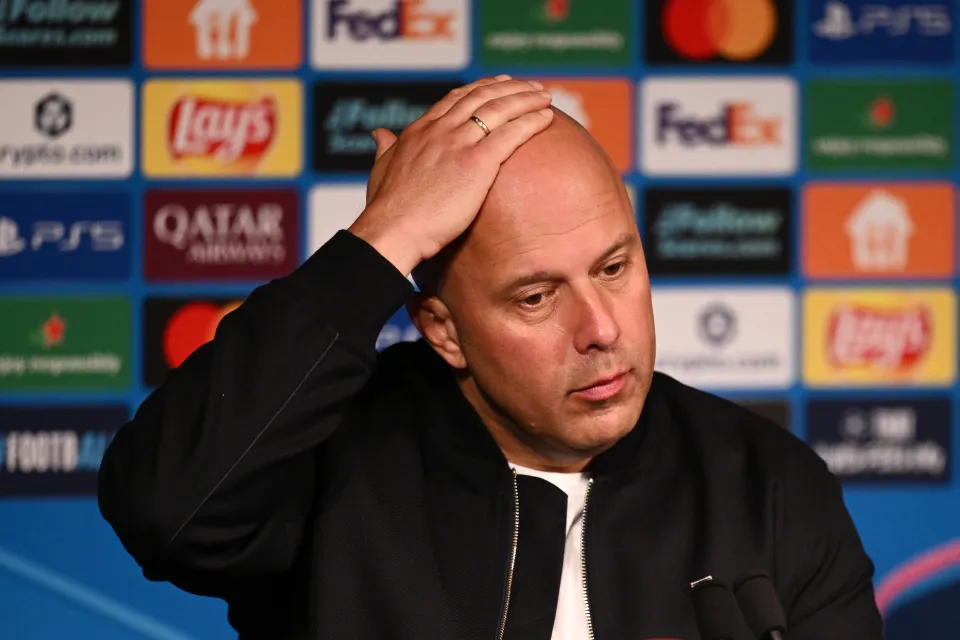 Arne Slot, Manager of Liverpool, reacts as he speaks to the media in a post match press conference following the UEFA Champions League 2025/26 Quarter-Final First Leg match between Paris Saint-Germain FC and Liverpool