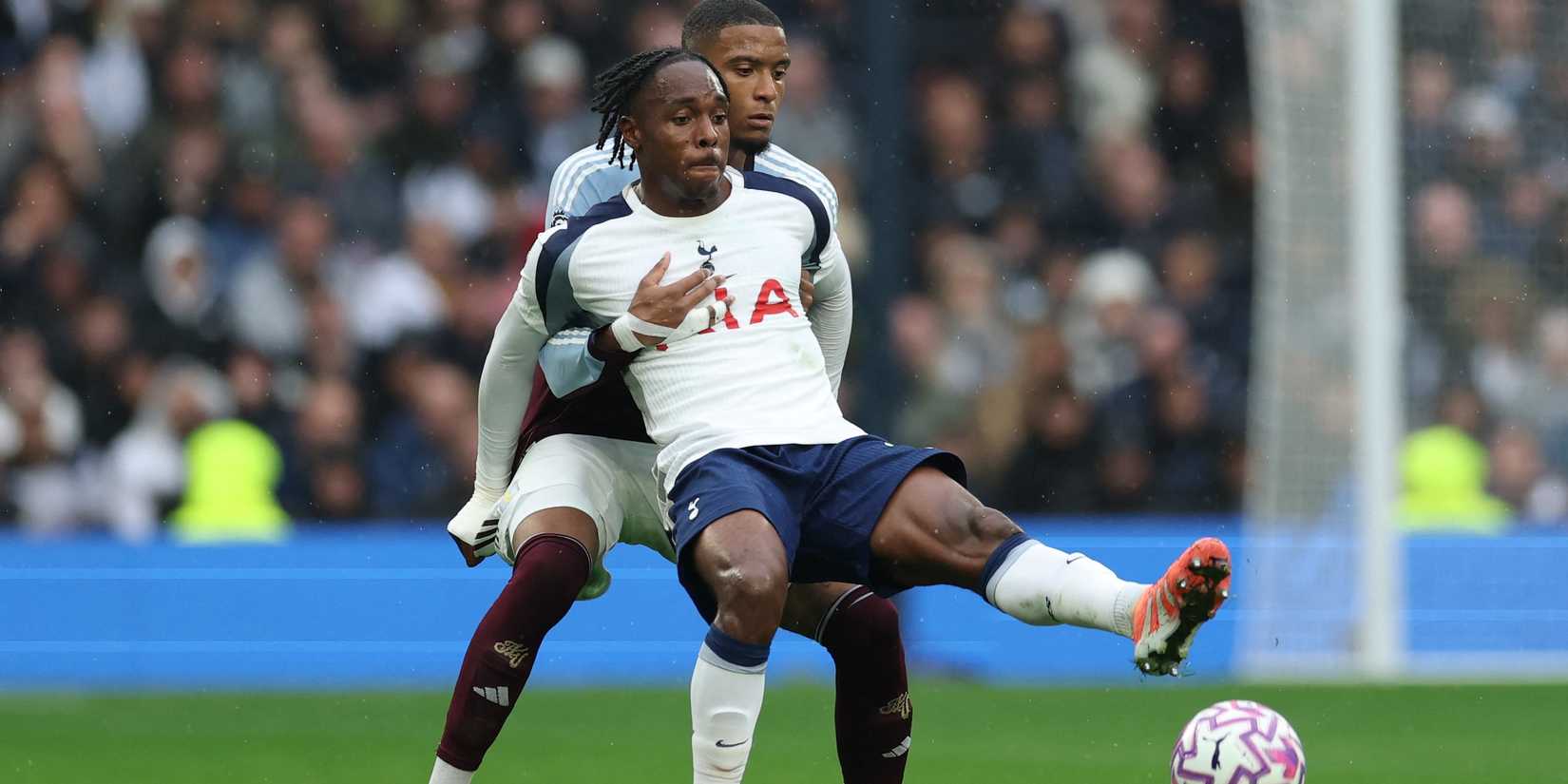 Aston Villa's Ezri Konsa in action with Tottenham Hotspur's Mathys Tel 